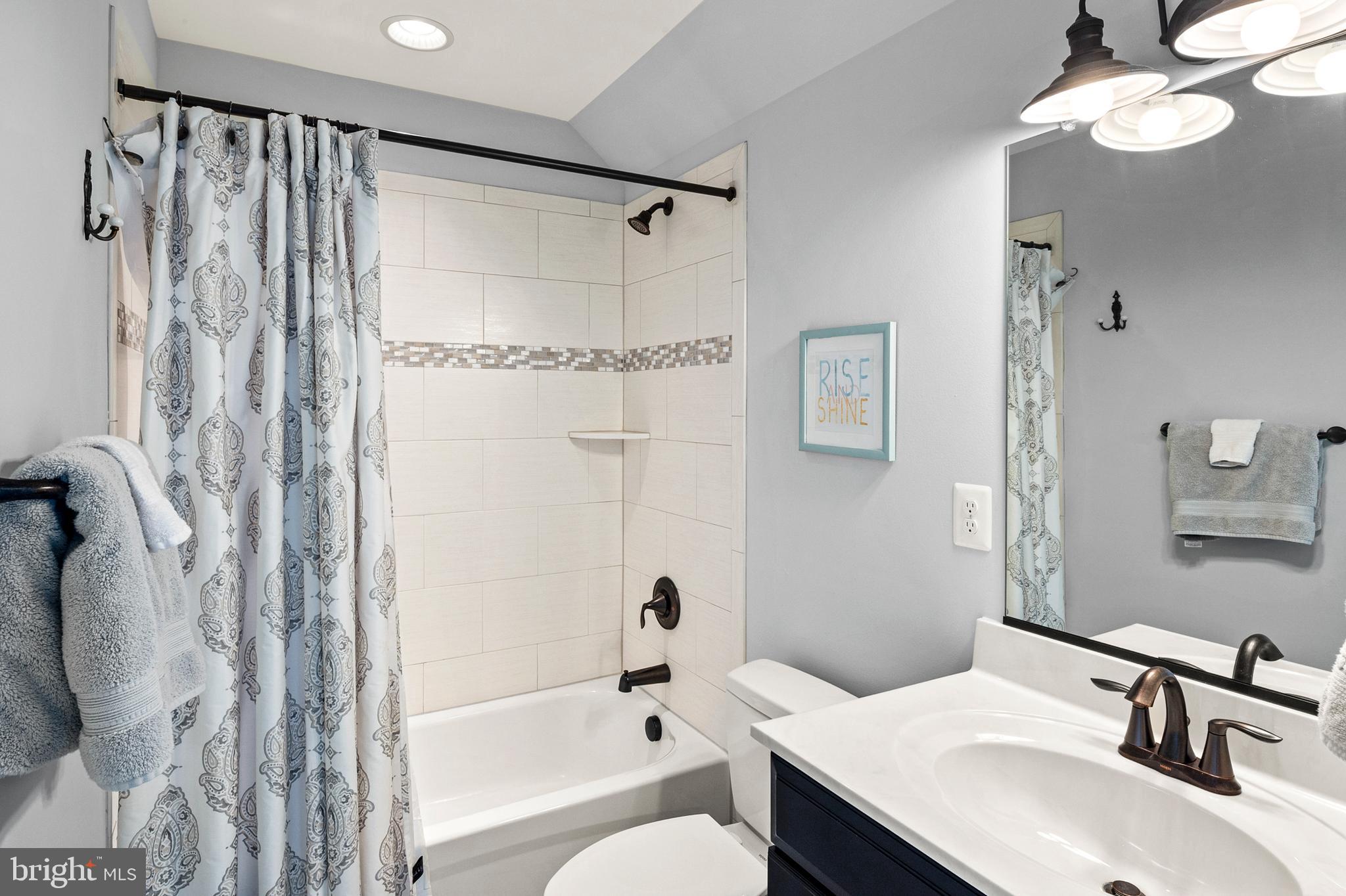 1760 Florence Road Mount Airy, MD 21771 - Photo 33 of 63 a bathroom with a sink toilet tub and shower