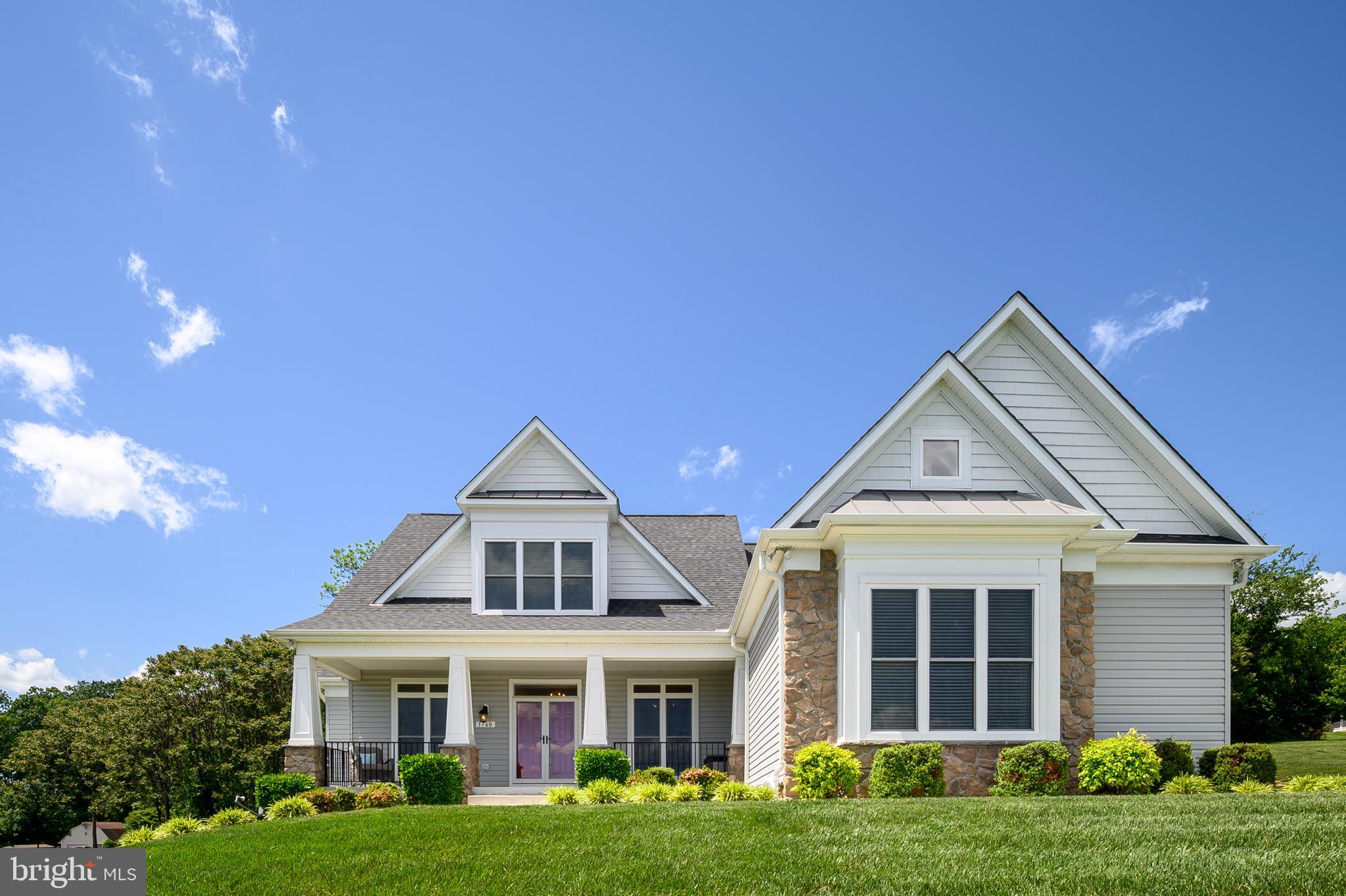 1760 Florence Road Mount Airy, MD 21771 - Photo 4 of 63 a front view of a house with a yard