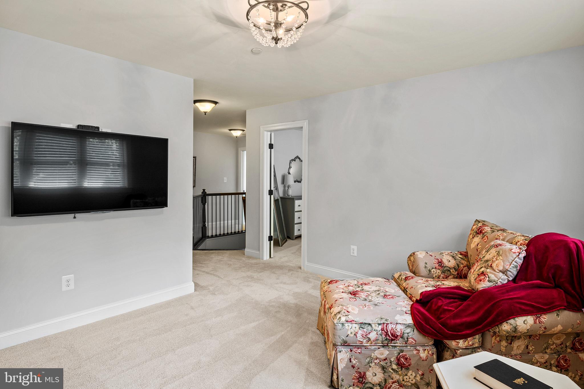 1760 Florence Road Mount Airy, MD 21771 - Photo 42 of 63 a living room with furniture and a flat screen tv