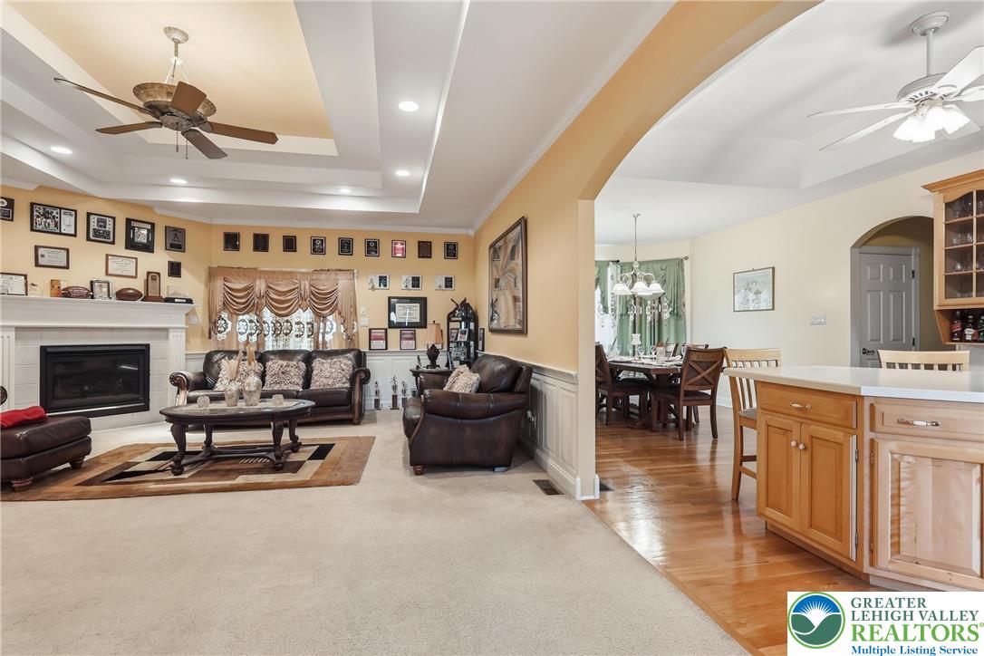 5217 Cider Press Road Schnecksville, PA 18078 - Photo 12 of 54 a living room with furniture and a fireplace