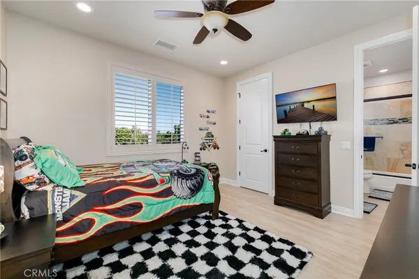 an aerial view of residential houses with city view