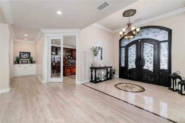 a living room with fireplace furniture and a flat screen tv