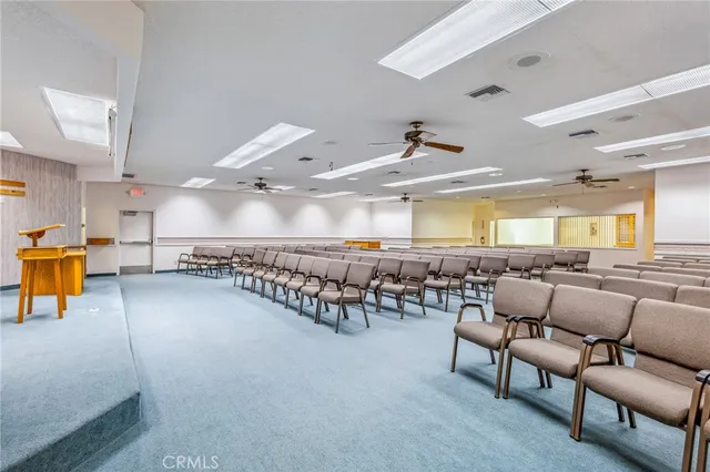 a room with table and chairs