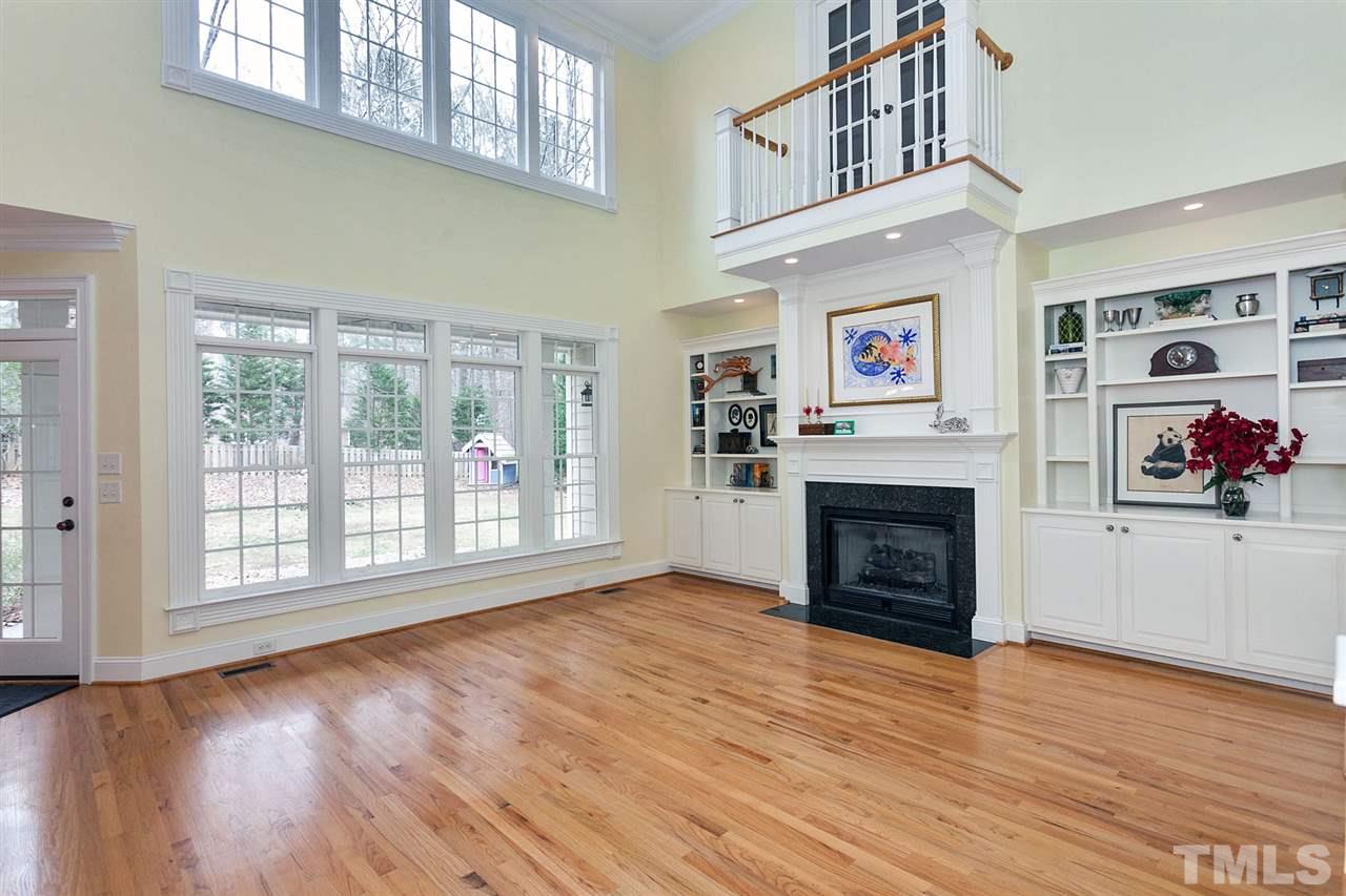 2001 Angelwing Court Raleigh, NC 27613 - Photo 8 of 23 a view of an empty room with window and fire place