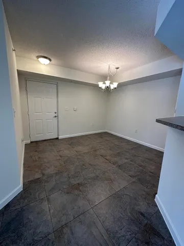 an empty room with a bathroom