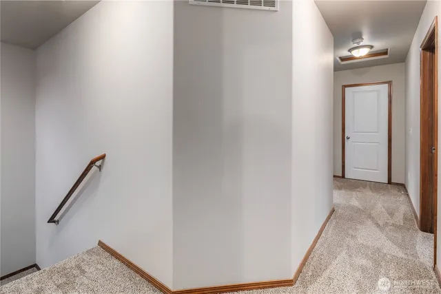 a view of a hallway with entryway