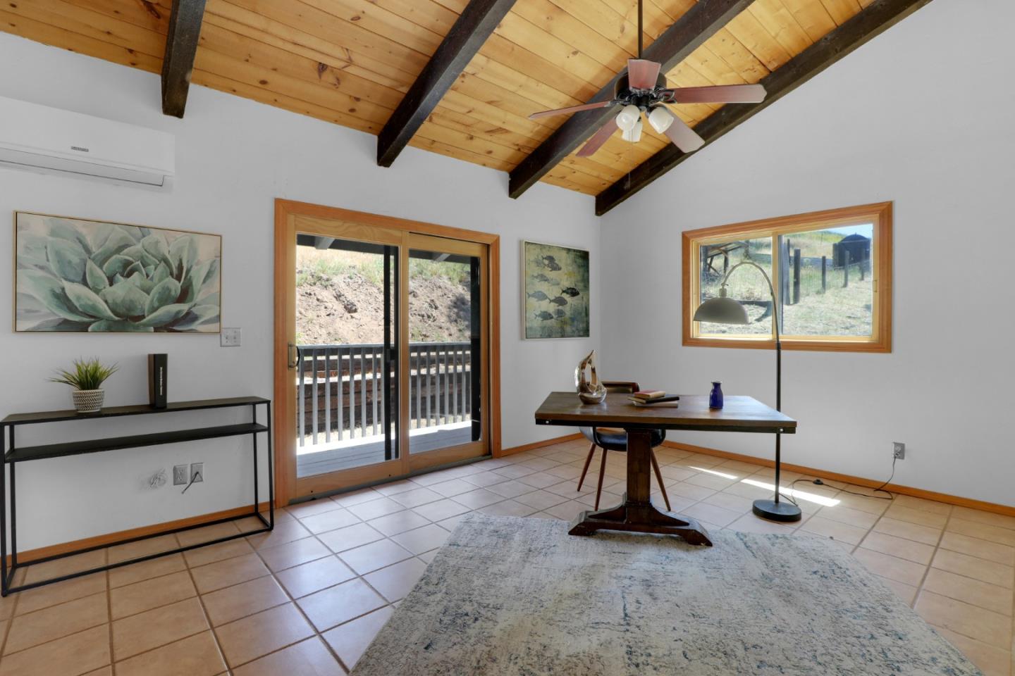 19235 Cachagua Road Carmel Valley, CA 93924 - Photo 13 of 34 a view of a workspace with furniture and a window