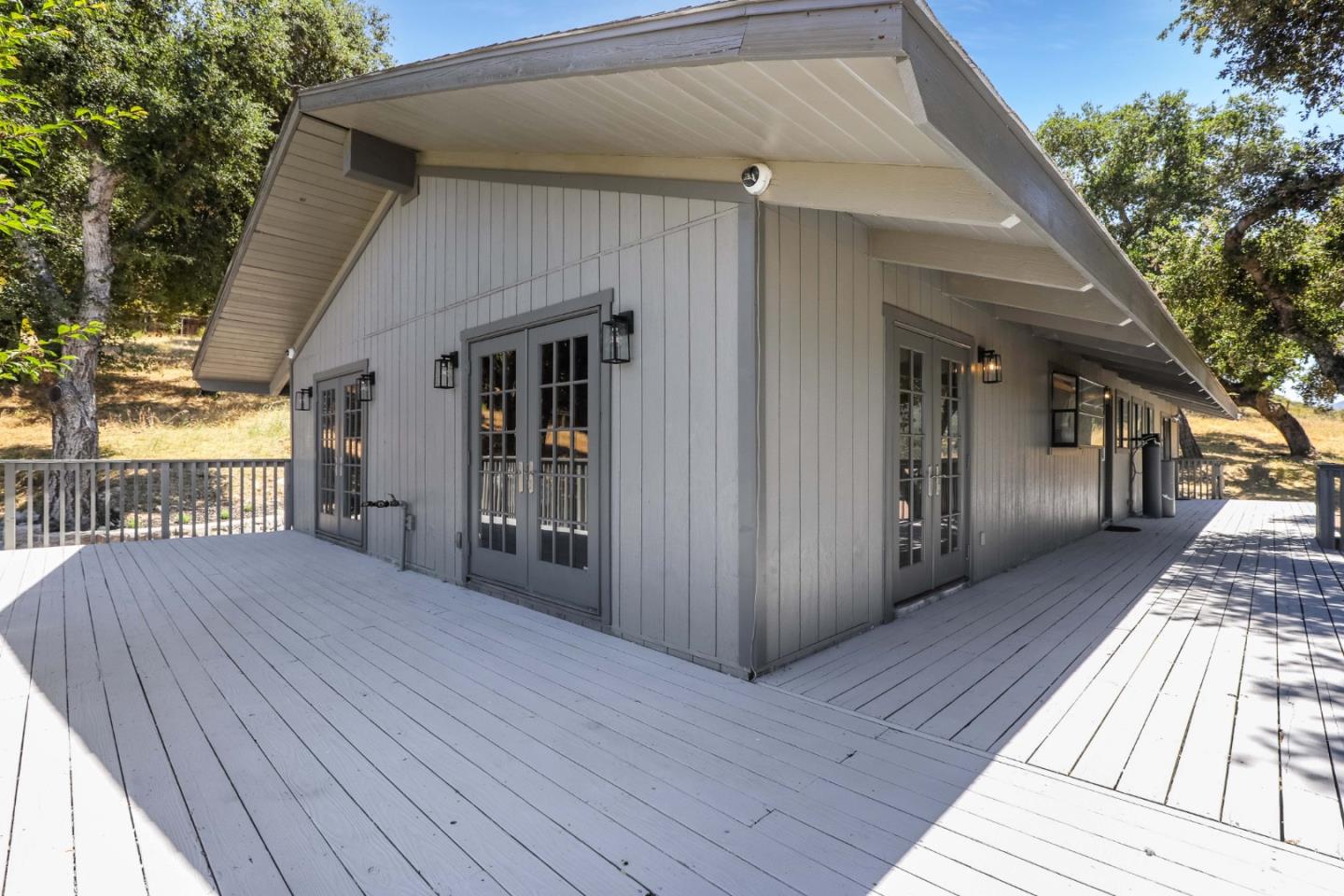 19235 Cachagua Road Carmel Valley, CA 93924 - Photo 2 of 34 a view of a house with a deck