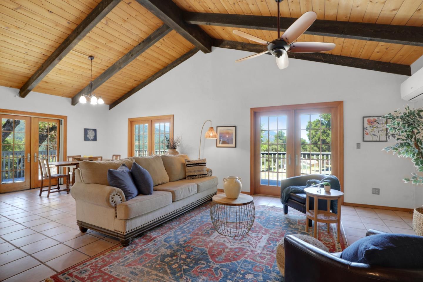 19235 Cachagua Road Carmel Valley, CA 93924 - Photo 4 of 34 a living room with furniture and a large window