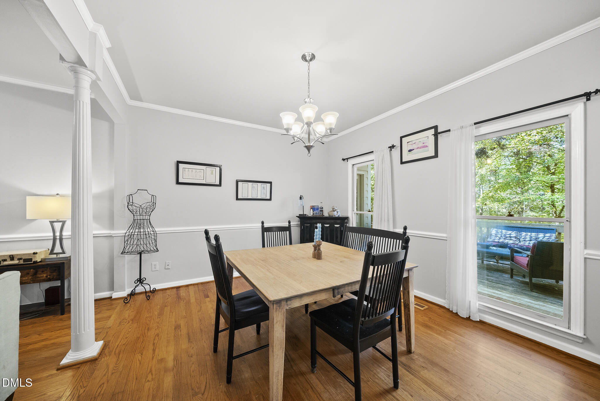 12304 Whartons Way Raleigh, NC 27613 - Photo 9 of 35 Dining area flows seamlessly into the family room