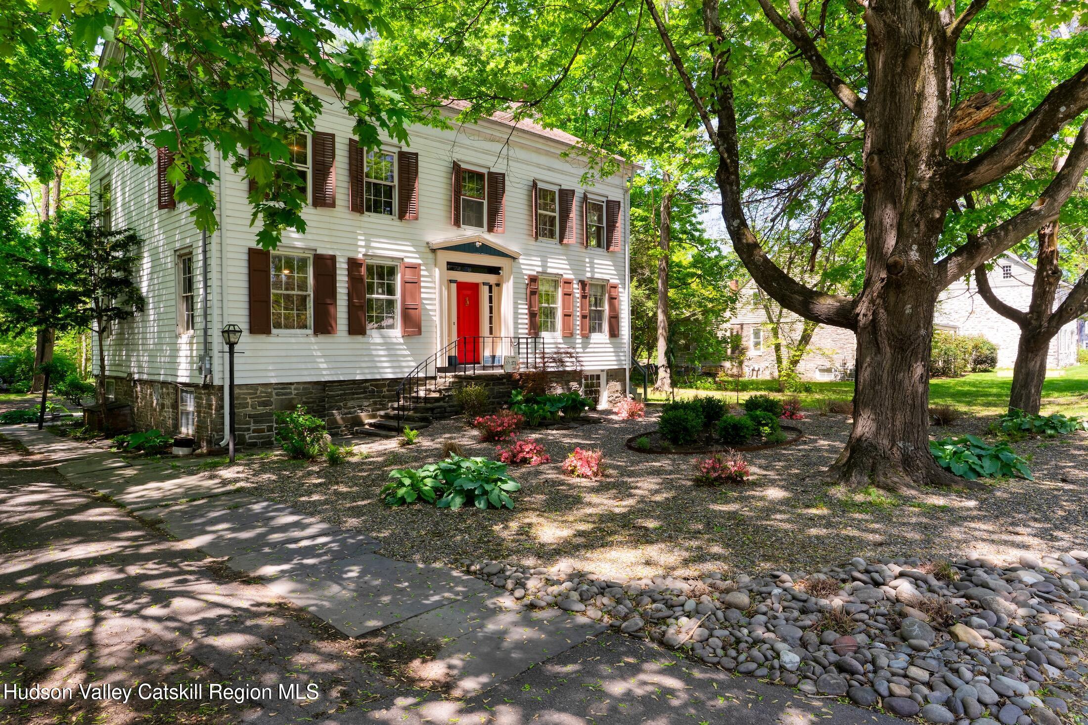3714 Main Street Stone Ridge, NY 12484 - Photo 2 of 31 a front view of a house with garden