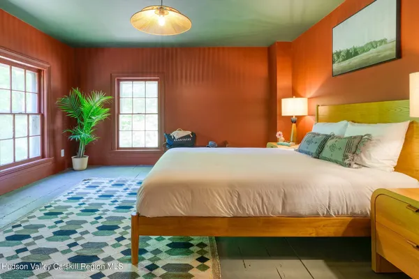 a bathroom with a toilet and shower