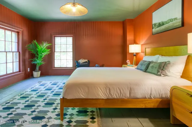 a bathroom with a toilet and shower