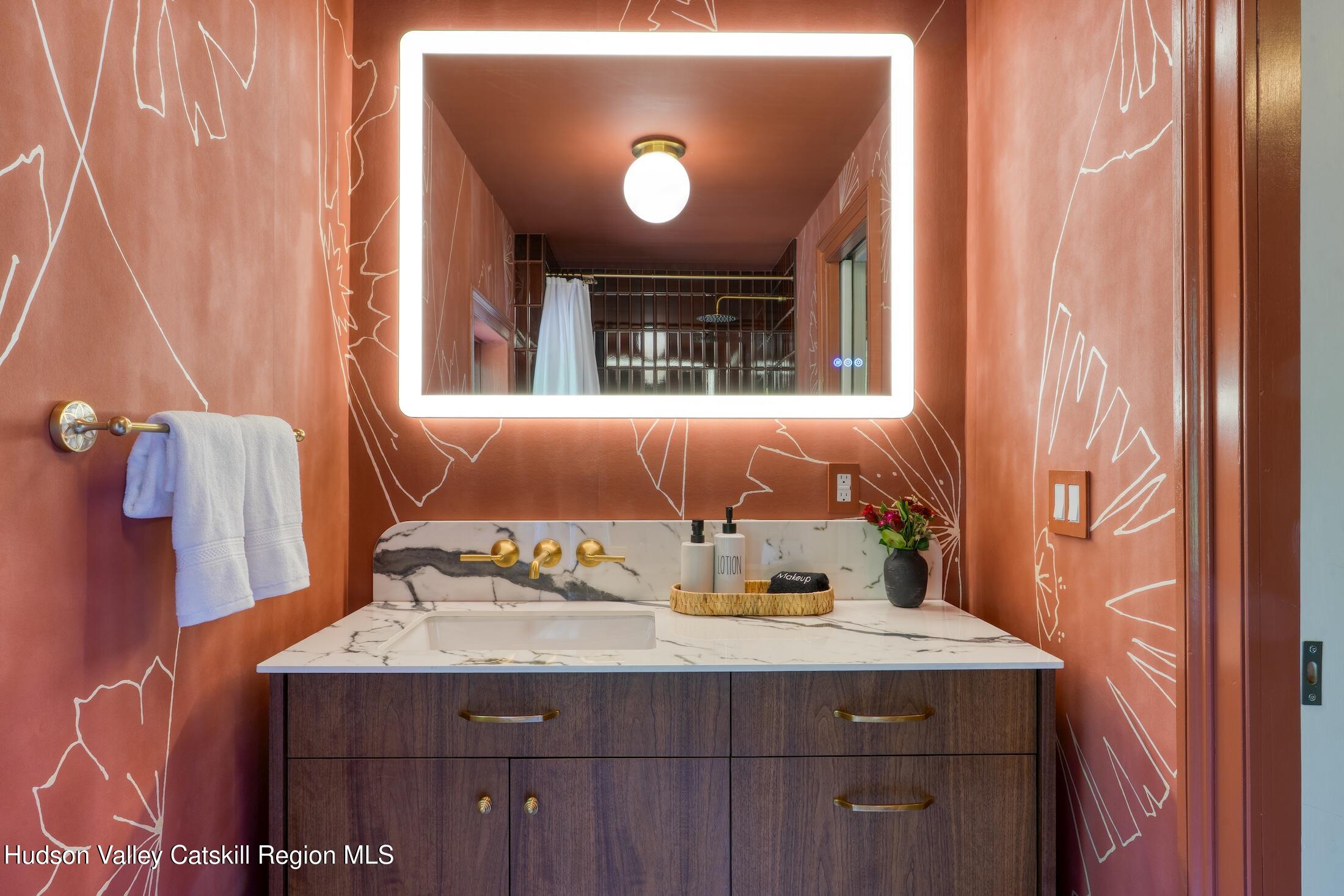 3714 Main Street Stone Ridge, NY 12484 - Photo 23 of 31 a bathroom with a sink and a mirror
