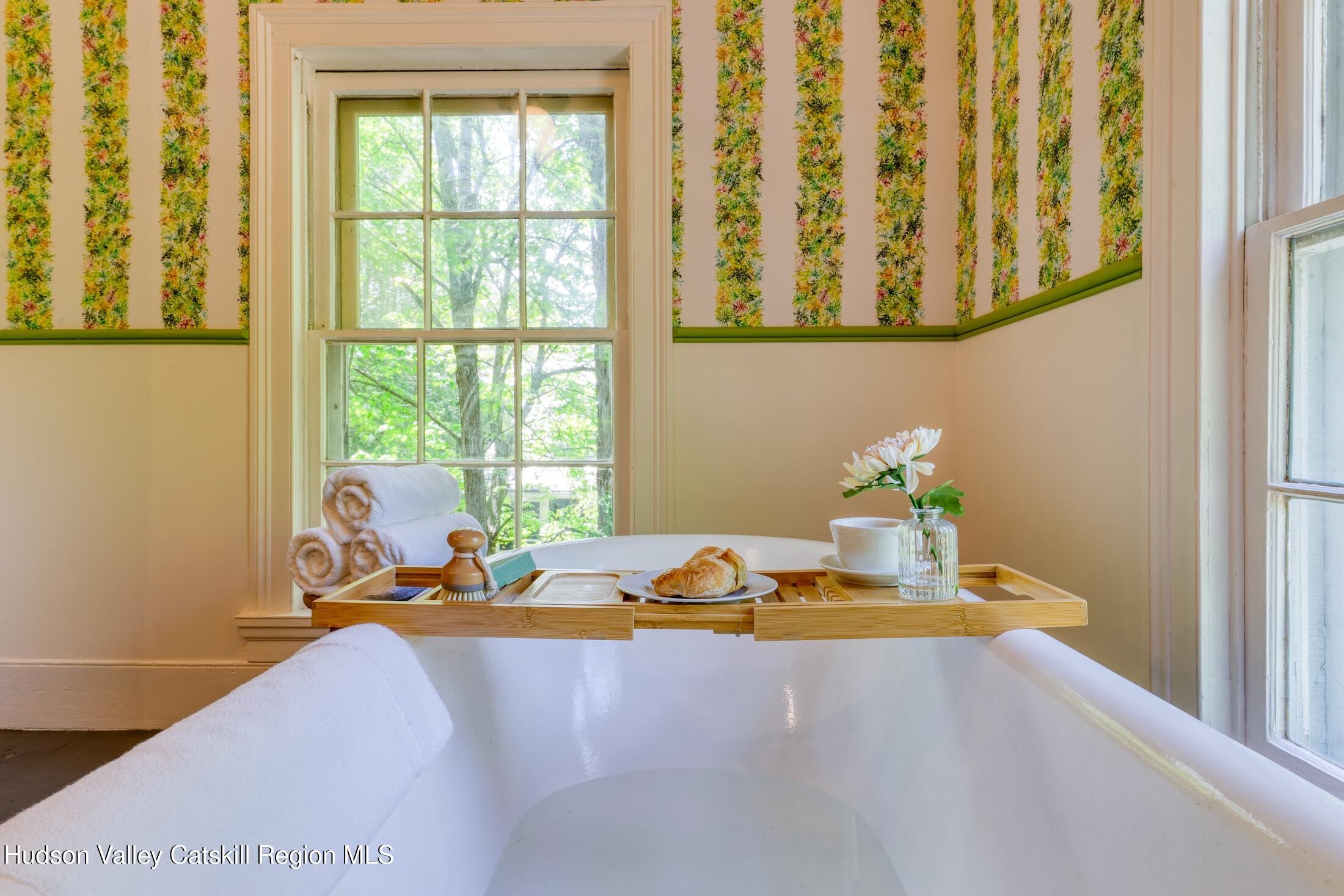 3714 Main Street Stone Ridge, NY 12484 - Photo 27 of 31 a room with a window bed and couch