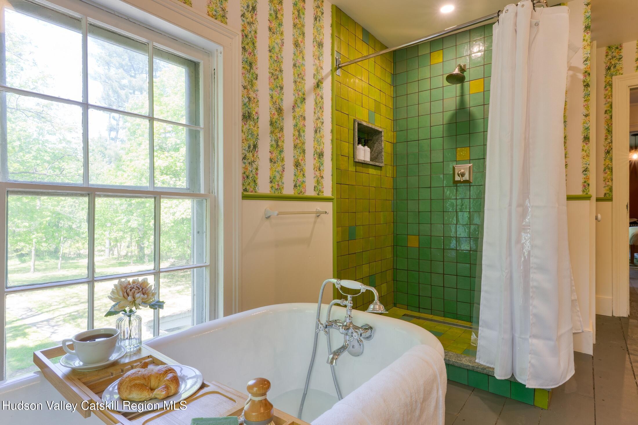3714 Main Street Stone Ridge, NY 12484 - Photo 28 of 31 a bath room with a bath tub and a shower