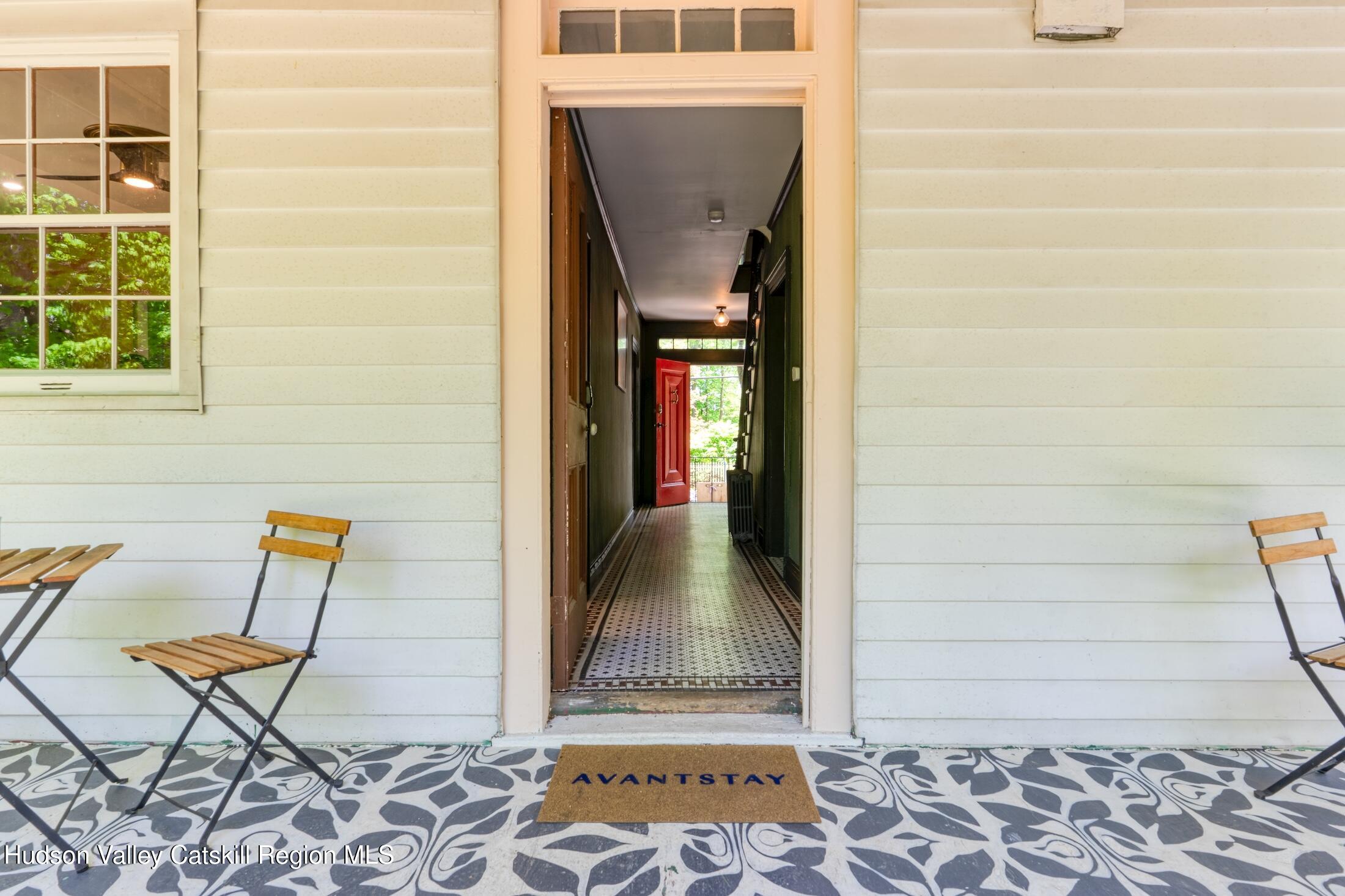 3714 Main Street Stone Ridge, NY 12484 - Photo 31 of 31 a view of a door with a bench and bench in front of door
