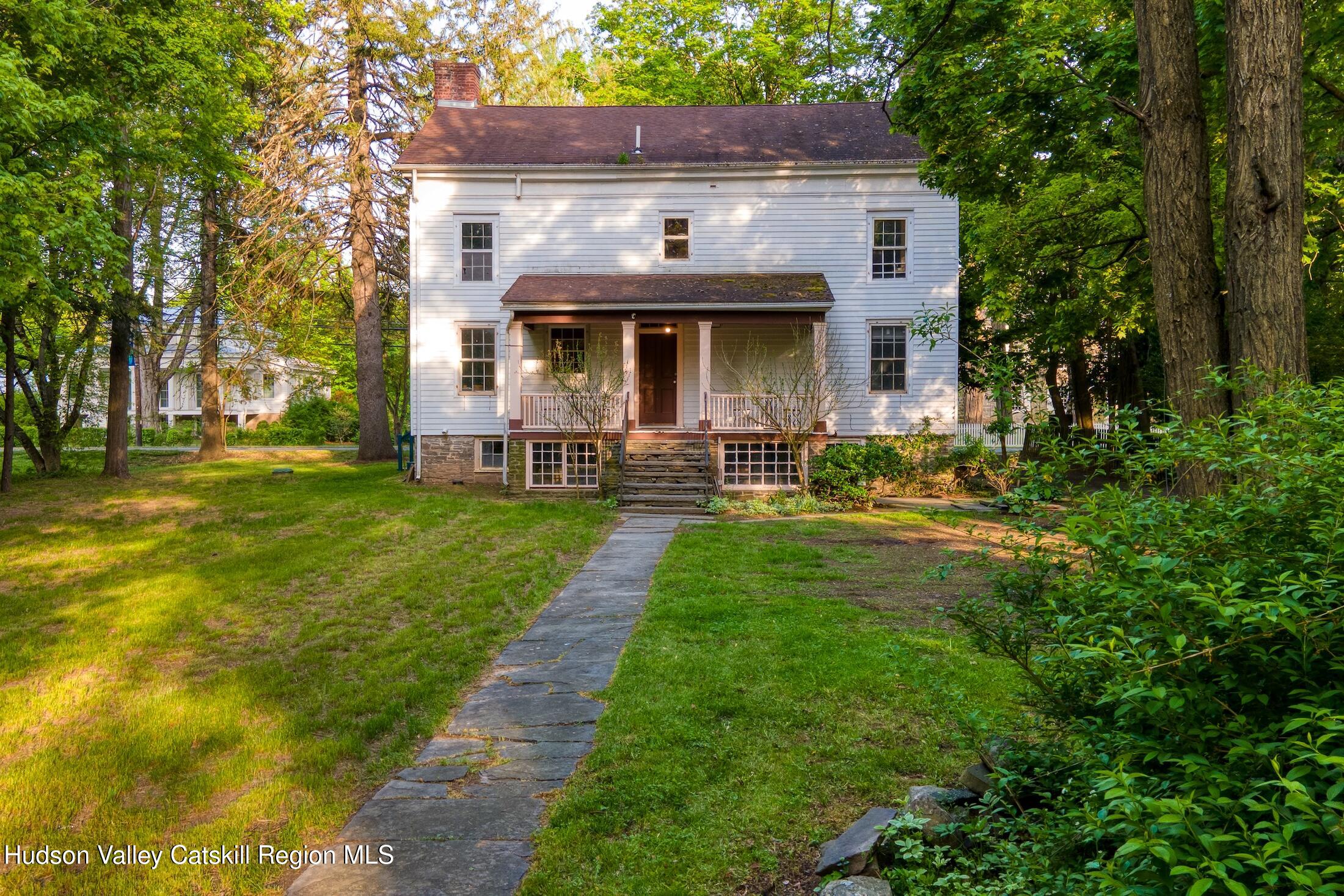 3714 Main Street Stone Ridge, NY 12484 - Photo 6 of 31 a front view of a house with a yard