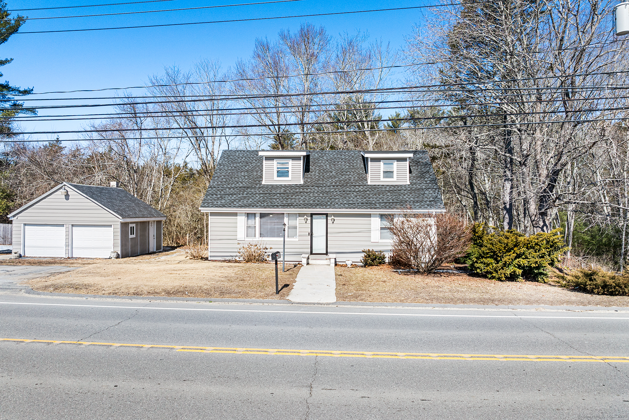 a view of a brick building next to a road