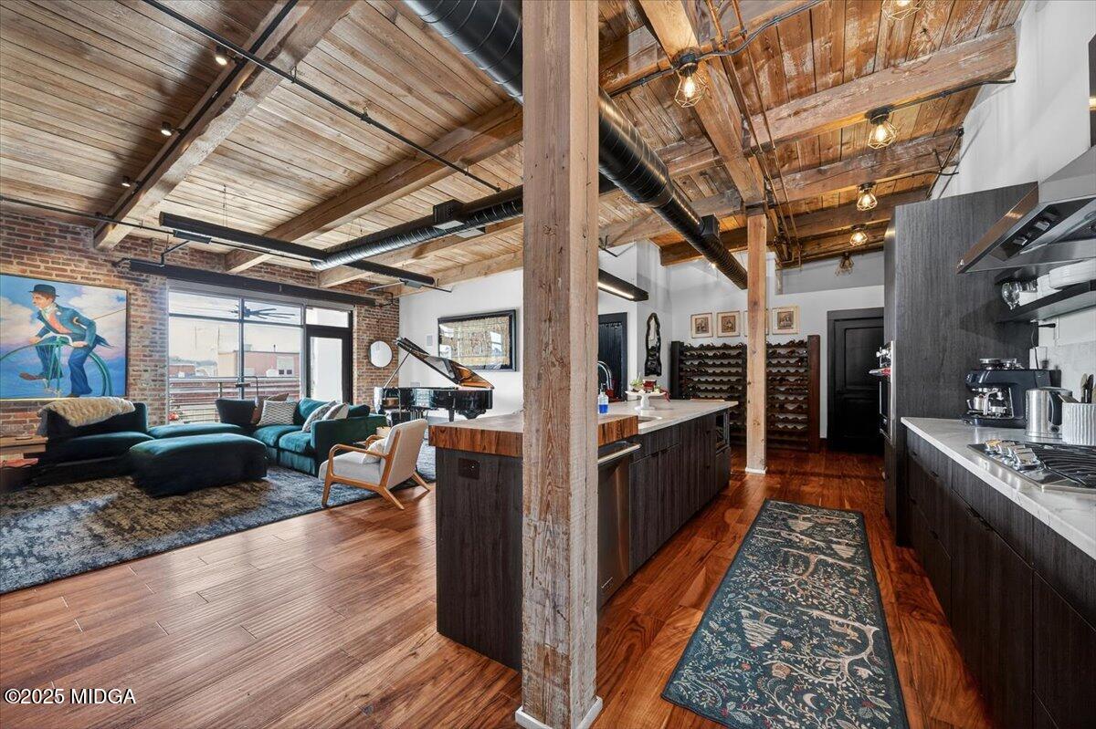 a view of a porch with wooden floors