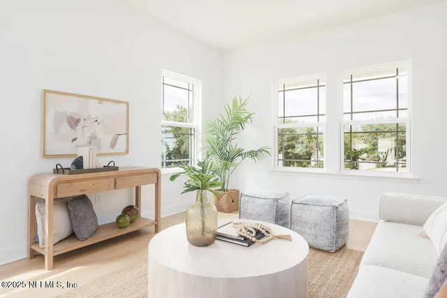 a dining room with table and chairs