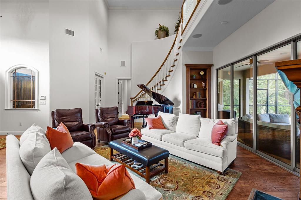 10826 Alico Pass New Port Richey, FL 34655 - Photo 8 of 51 a living room with furniture and a large window