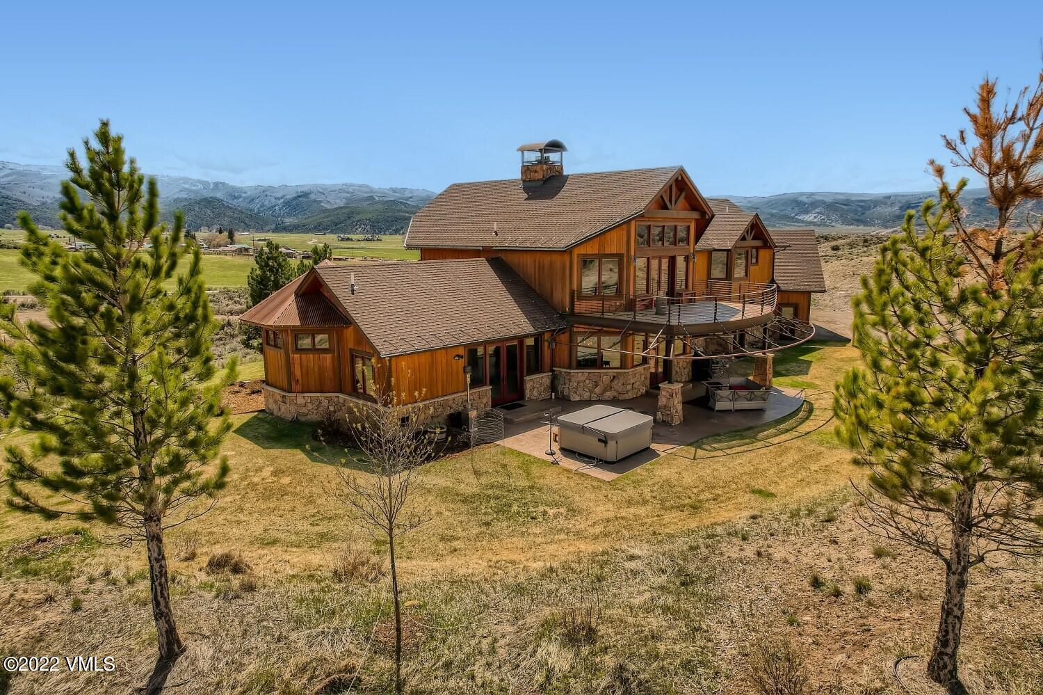 290 Amherst Road Gypsum, CO 81637 - Photo 29 of 32 a view of a house with a big yard