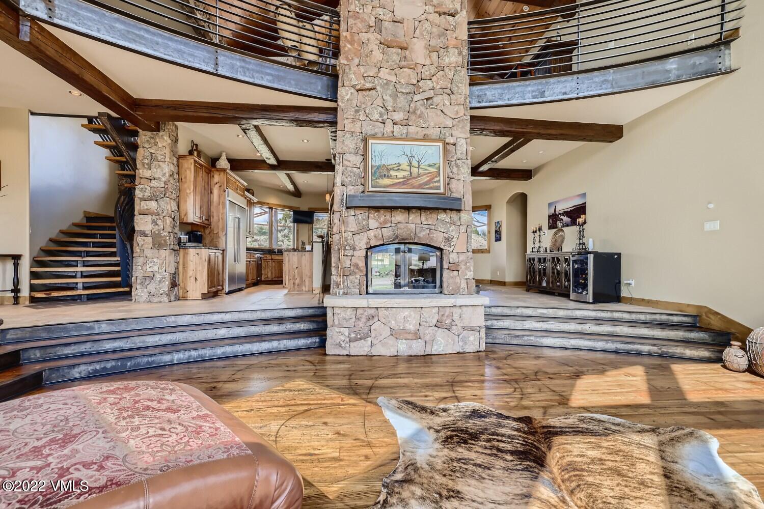 290 Amherst Road Gypsum, CO 81637 - Photo 3 of 32 a view of living room with furniture and fireplace