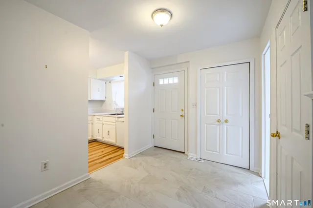 a view of a kitchen with a sink