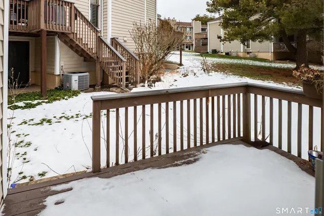 a view of a street with a building in the background