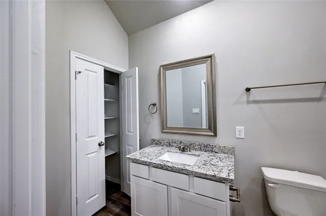 a bathroom with a shower and toilet