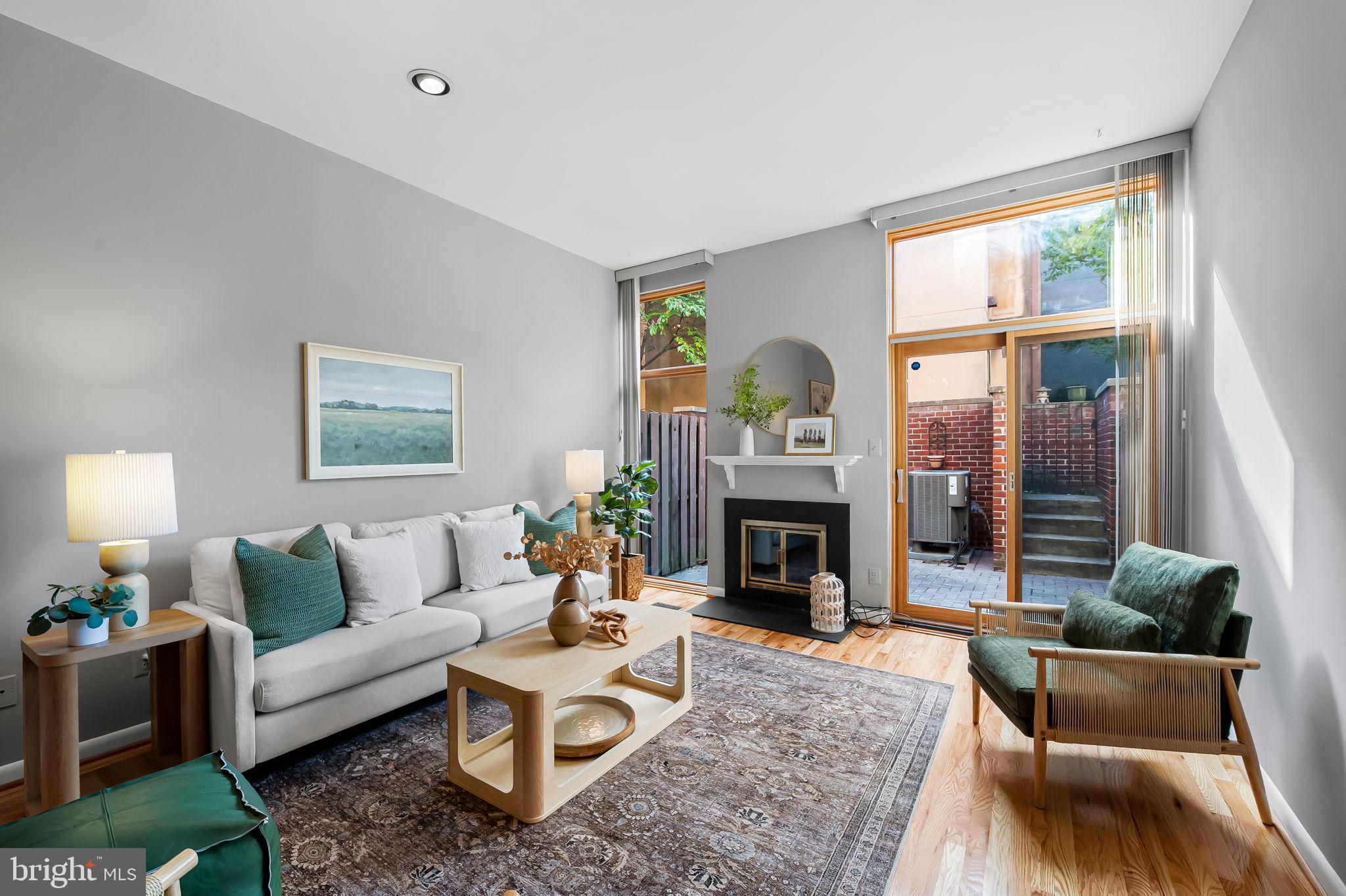 630 South Hanover Street Baltimore, MD 21230 - Photo 15 of 55 a living room with furniture and a fireplace