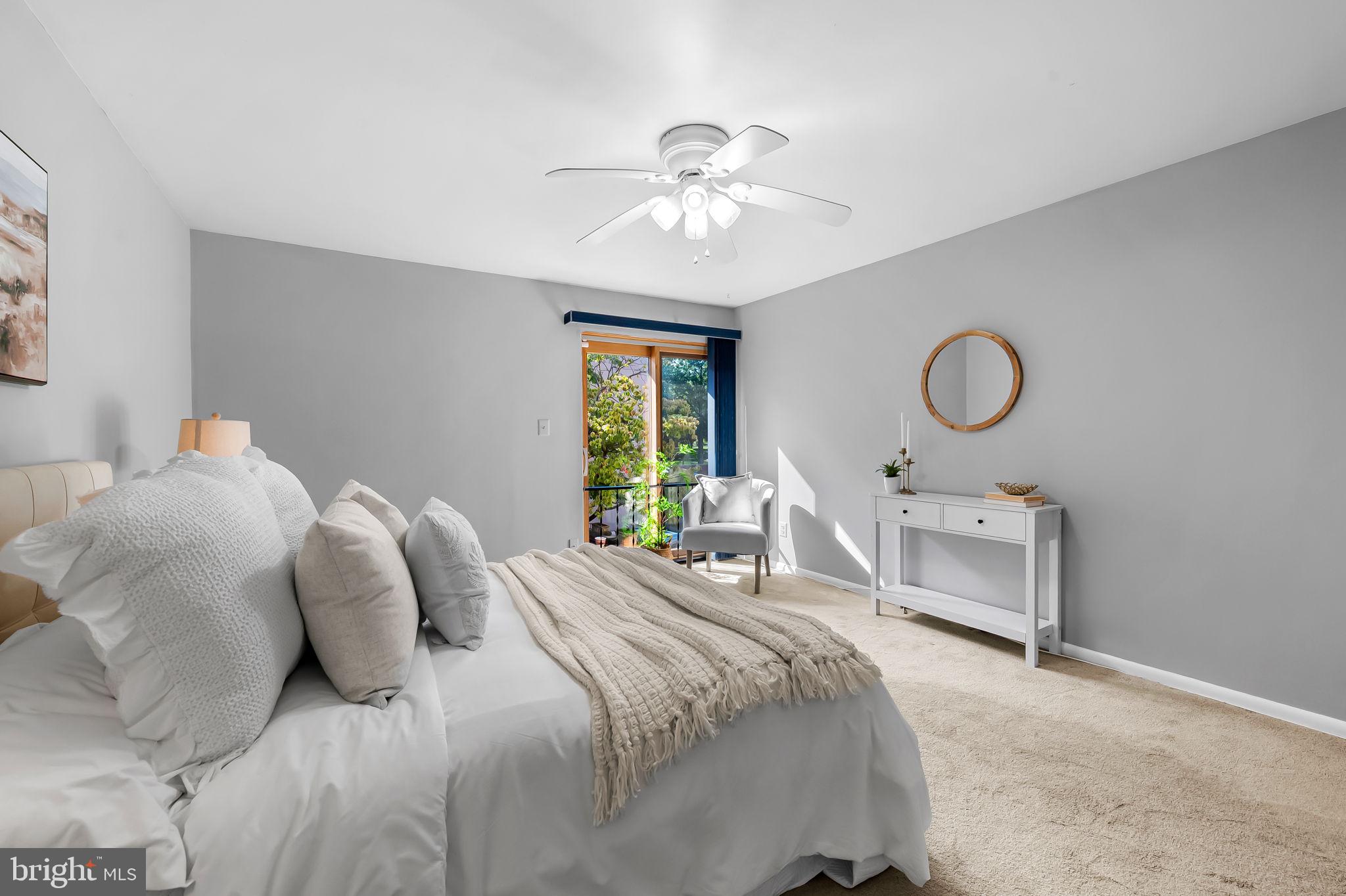 630 South Hanover Street Baltimore, MD 21230 - Photo 21 of 55 a bedroom with a bed and a chandelier