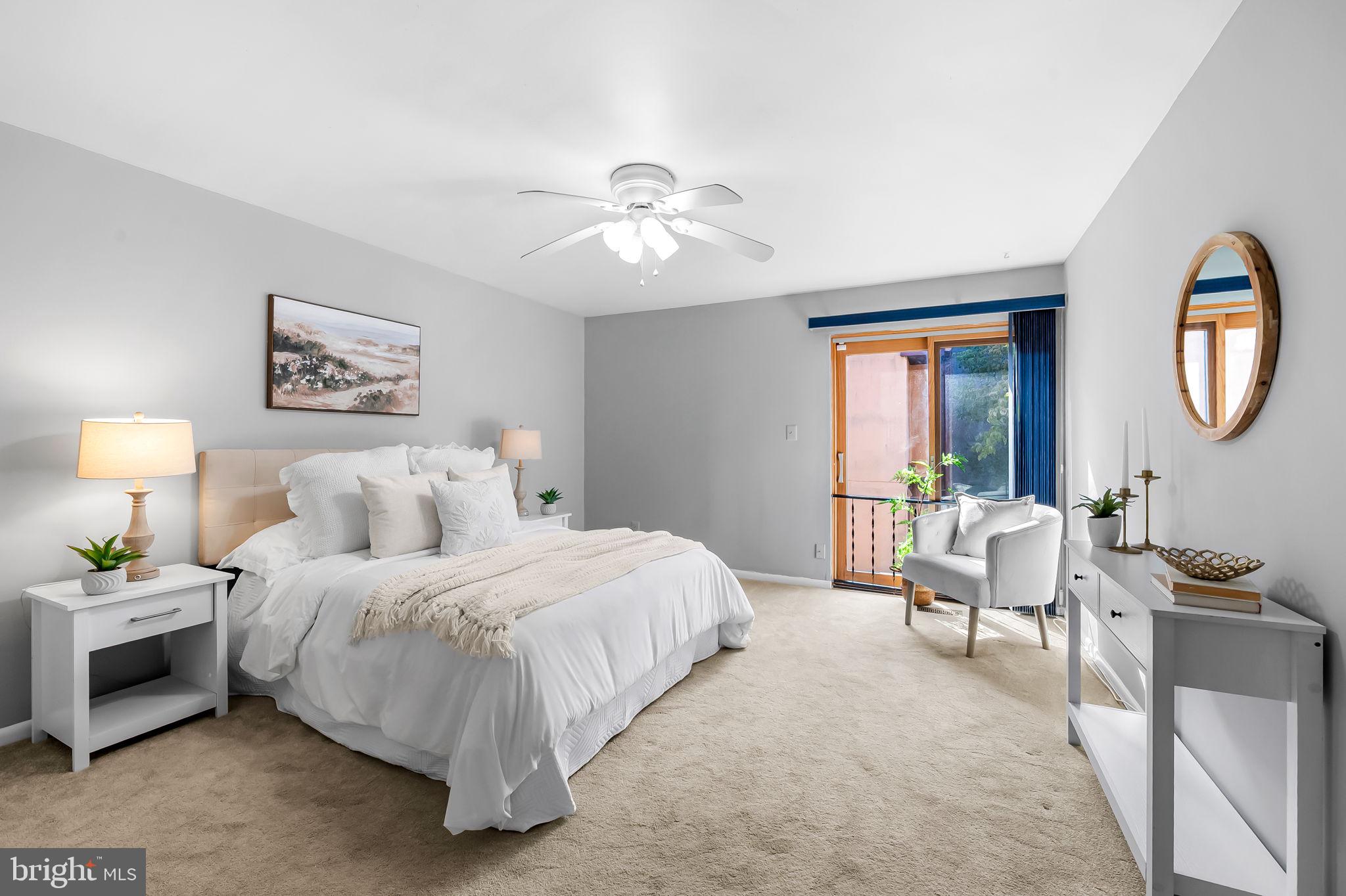 630 South Hanover Street Baltimore, MD 21230 - Photo 22 of 55 a bedroom with bed and a chandelier