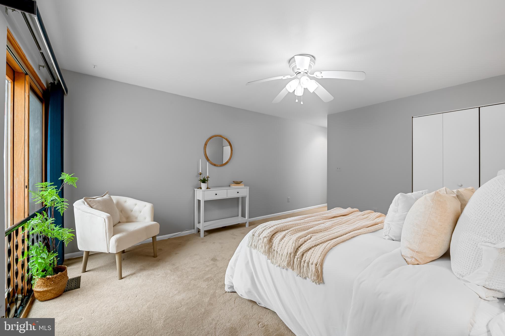 630 South Hanover Street Baltimore, MD 21230 - Photo 23 of 55 a bedroom with a bed and a chandelier