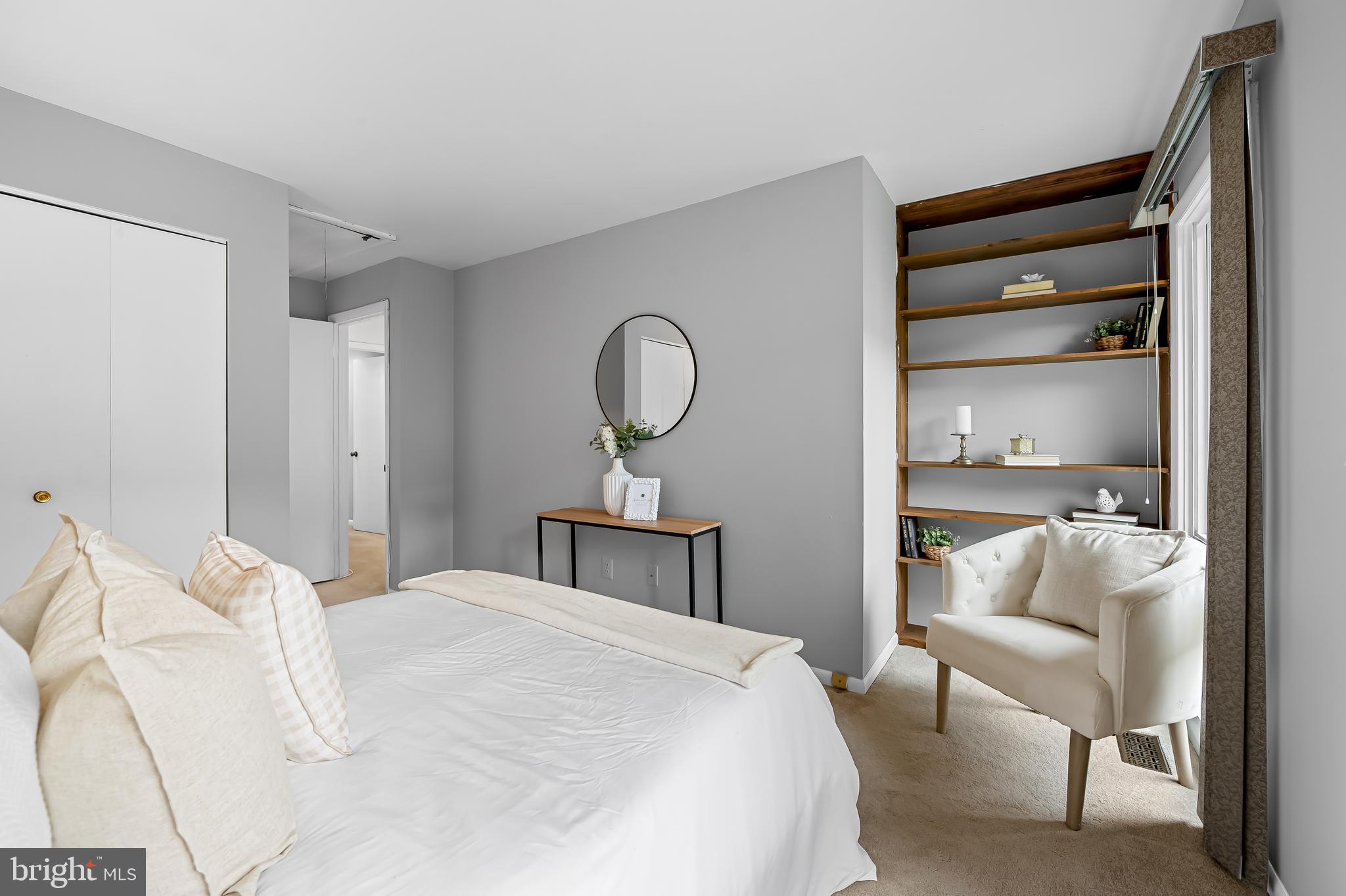 630 South Hanover Street Baltimore, MD 21230 - Photo 28 of 55 a bedroom with a bed and a chandelier