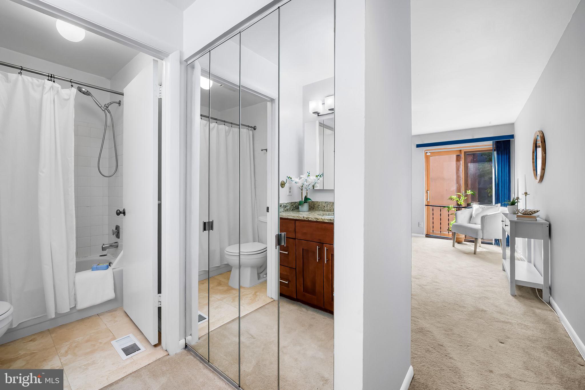 630 South Hanover Street Baltimore, MD 21230 - Photo 30 of 55 a view of a bathroom with tub and shower