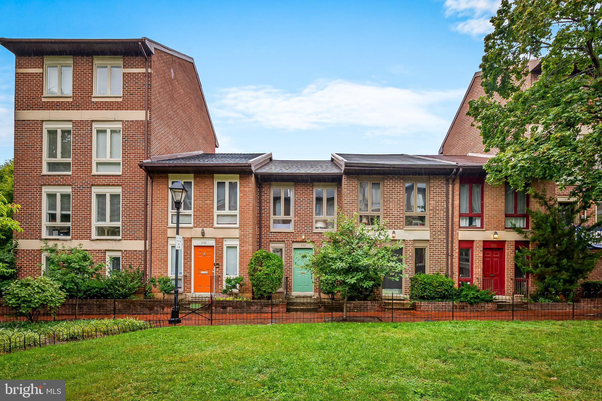 630 South Hanover Street Baltimore, MD 21230 - Photo 45 of 55 front view of a brick house with a yard
