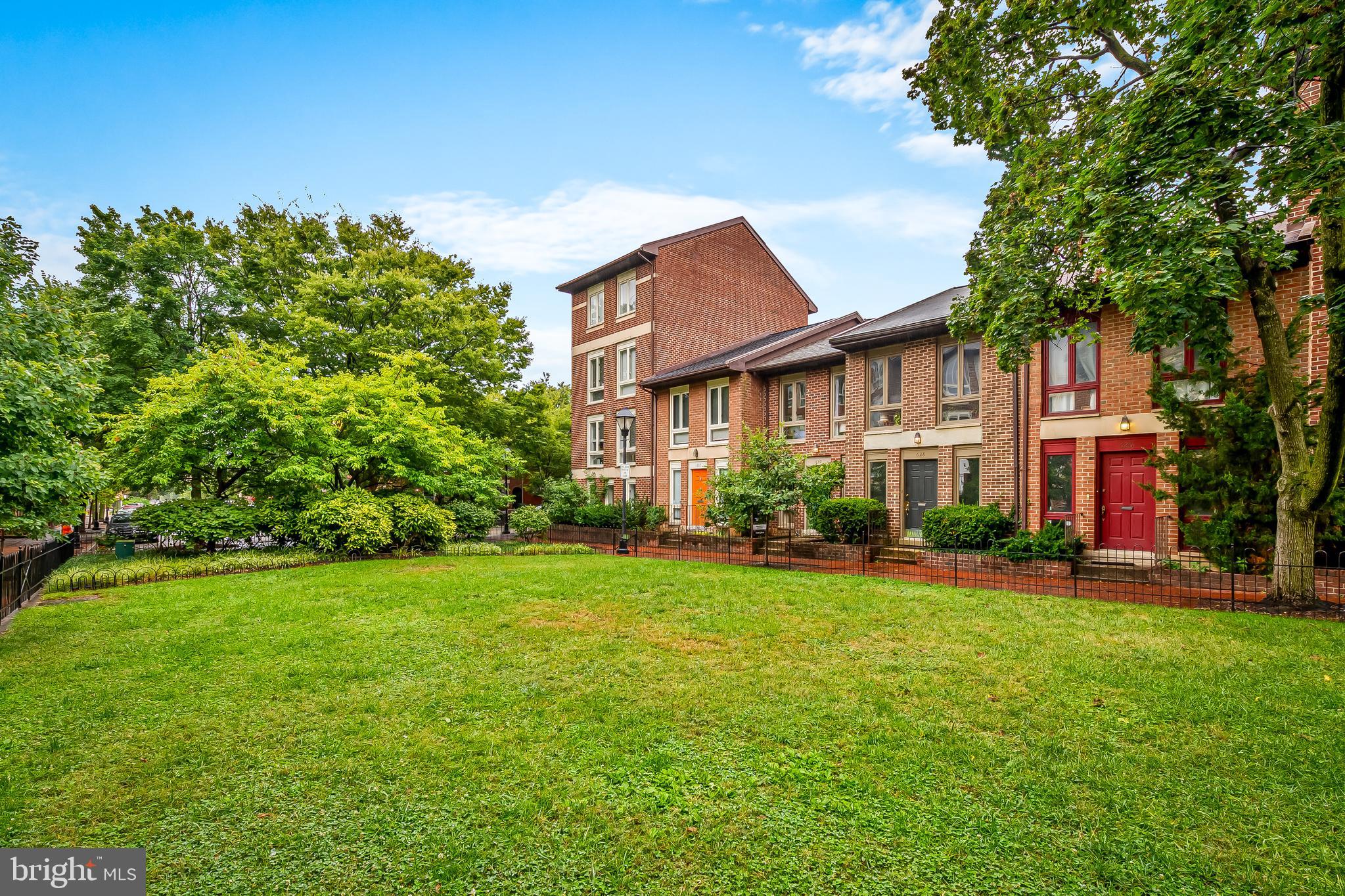 630 South Hanover Street Baltimore, MD 21230 - Photo 53 of 55 a front view of a house with a garden