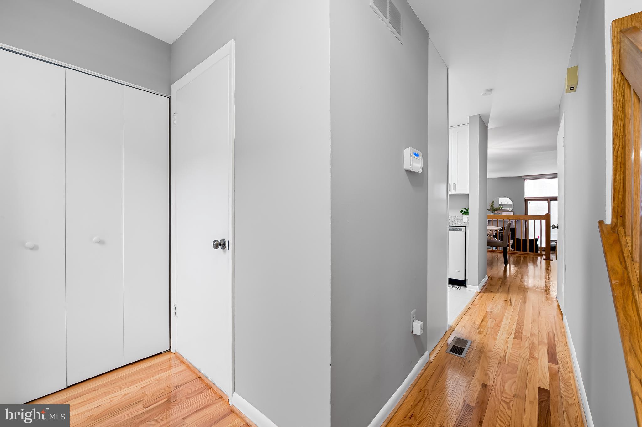 630 South Hanover Street Baltimore, MD 21230 - Photo 6 of 55 a view of a room with wooden floor