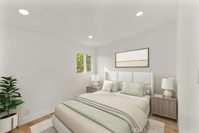 a view of a cars park in front of a building