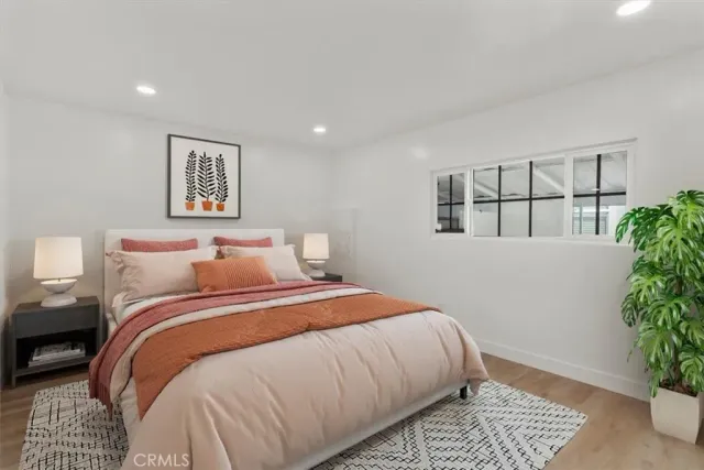 a view of a cars park in front of a building