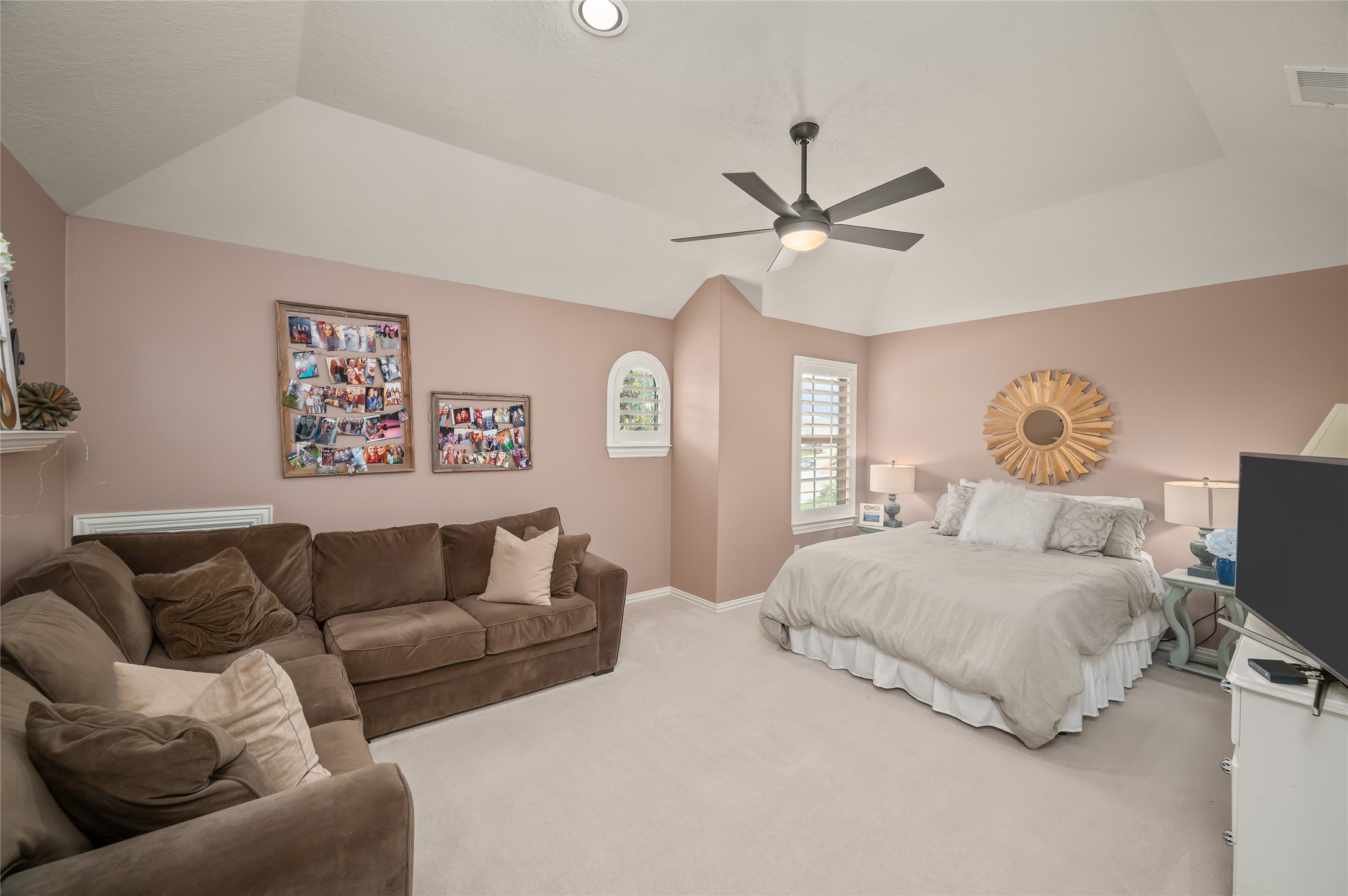 2127 Thicket Ridge Lane Houston, TX 77077 - Photo 26 of 48 This oversized upstairs bedroom can easily fit a king sized bed and an L-shaped couch. This bedroom shares a bathroom, has a walk-in closet and an access door to the attic for additional storage. This bedroom faces to front yard.