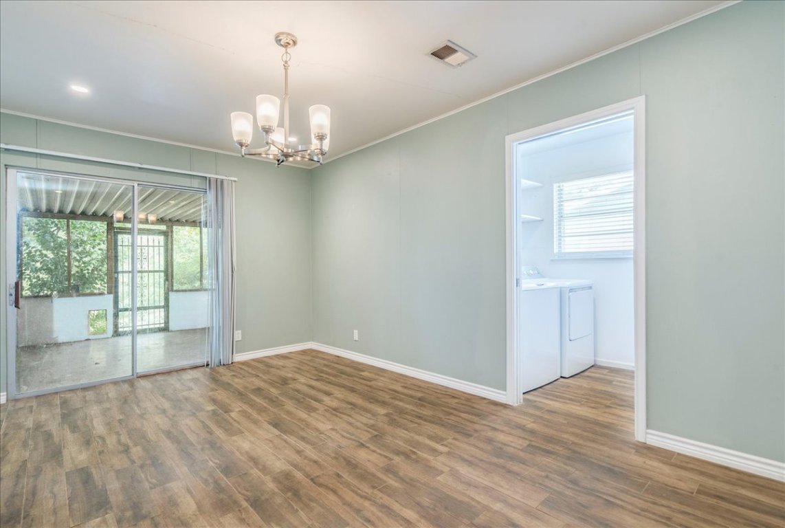 4712 Frontier Trail Austin, TX 78745 - Photo 12 of 32 a view of an empty room with a window