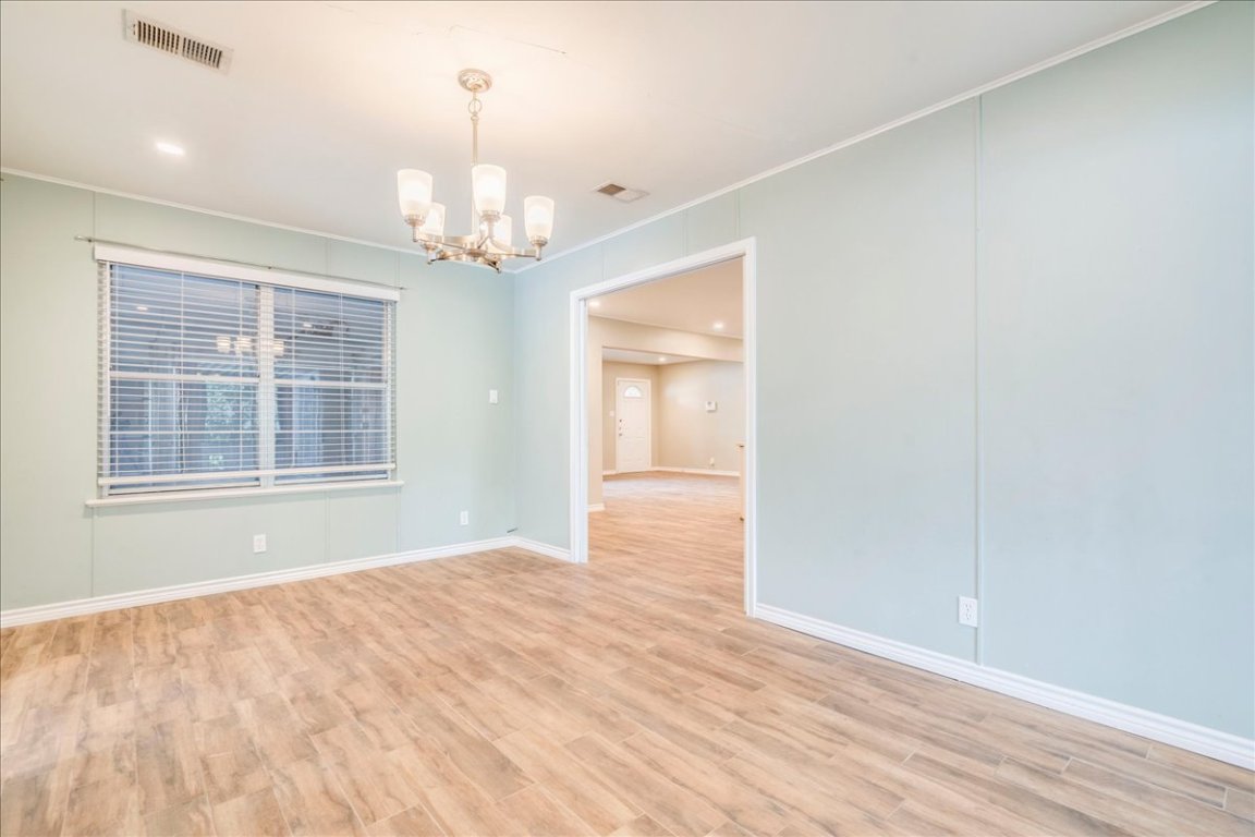 4712 Frontier Trail Austin, TX 78745 - Photo 13 of 32 a view of an empty room with a window
