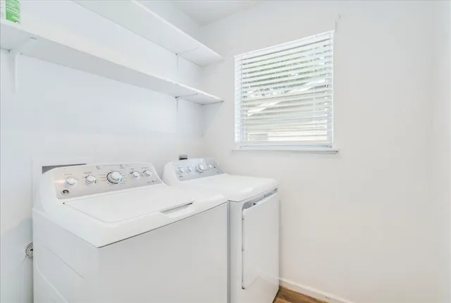 a utility room with dryer and washer