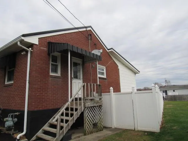 a view of house with street