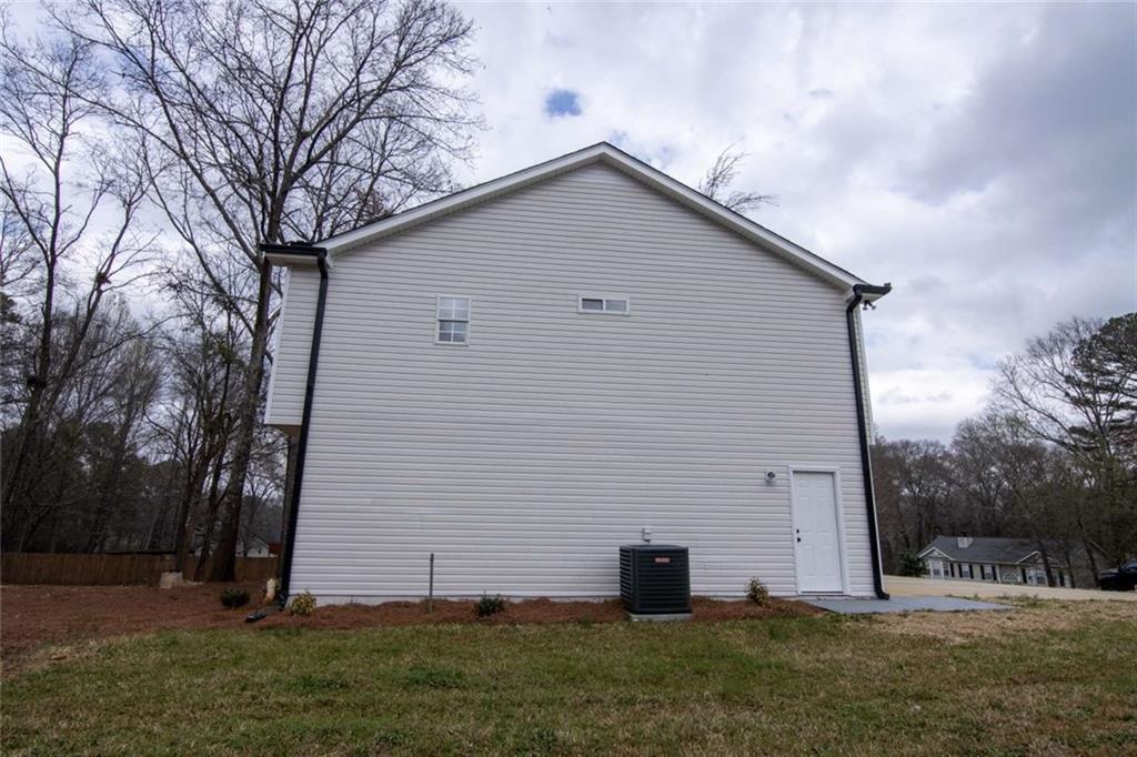 824 Eastmont Road Winder, GA 30680 - Photo 13 of 35 a backyard of house with green space