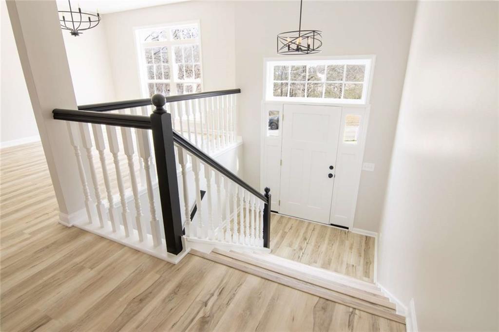 824 Eastmont Road Winder, GA 30680 - Photo 29 of 35 a view of an entryway with wooden floor