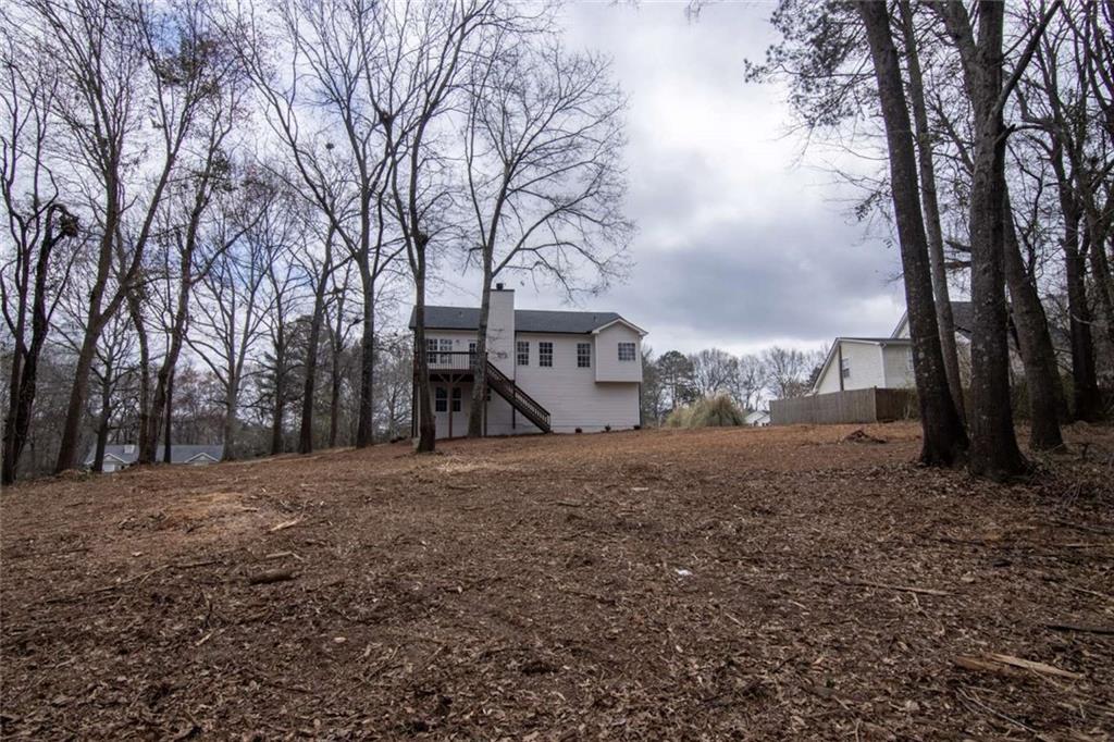 824 Eastmont Road Winder, GA 30680 - Photo 7 of 35 a large building with trees in front of it
